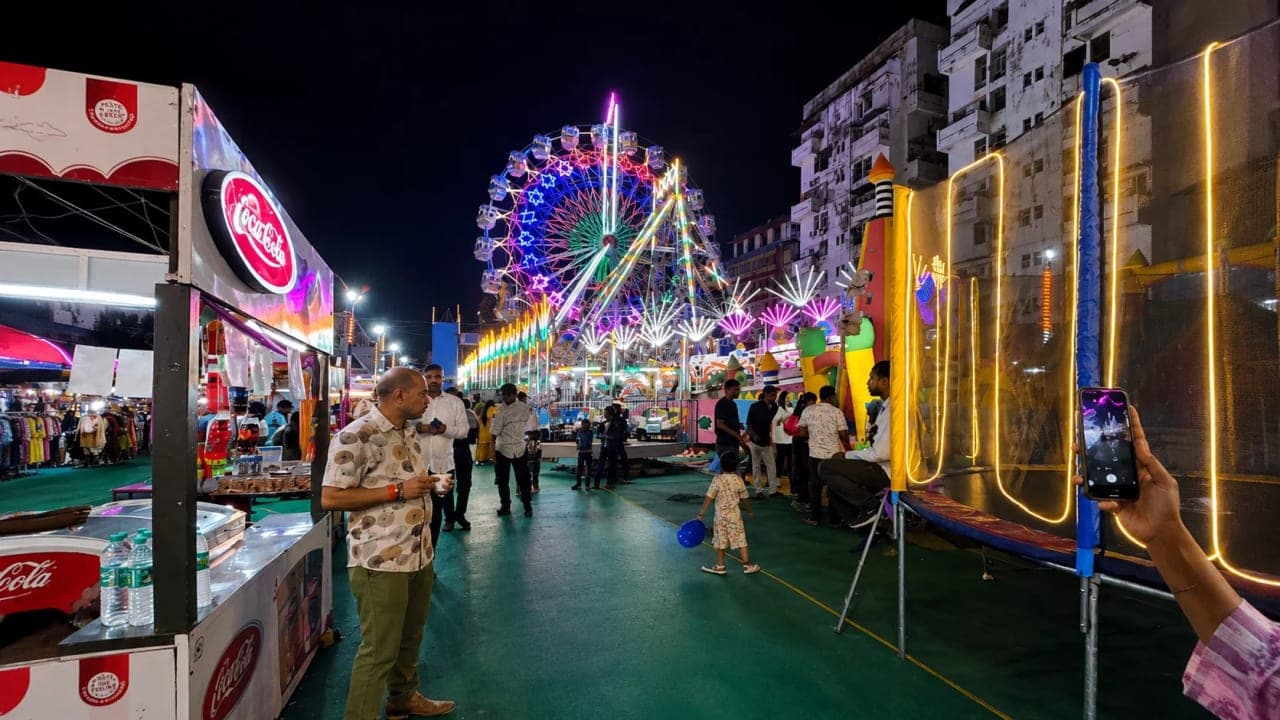 The seasonal Disneyland fair opposite ISKCON Temple, where a simple stop after shopping turned into a night of rides, snacks, games, and memories.