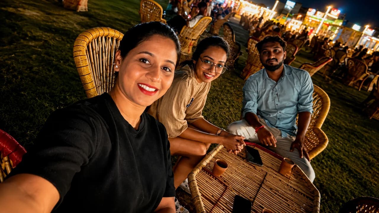 Friends sitting together at a local restaurant and hangout spot, enjoying food, conversations, and a relaxed evening before their upcoming trip. The gathering was part of a memorable week spent exploring Delhi, reconnecting with old friends, and creating new memories.