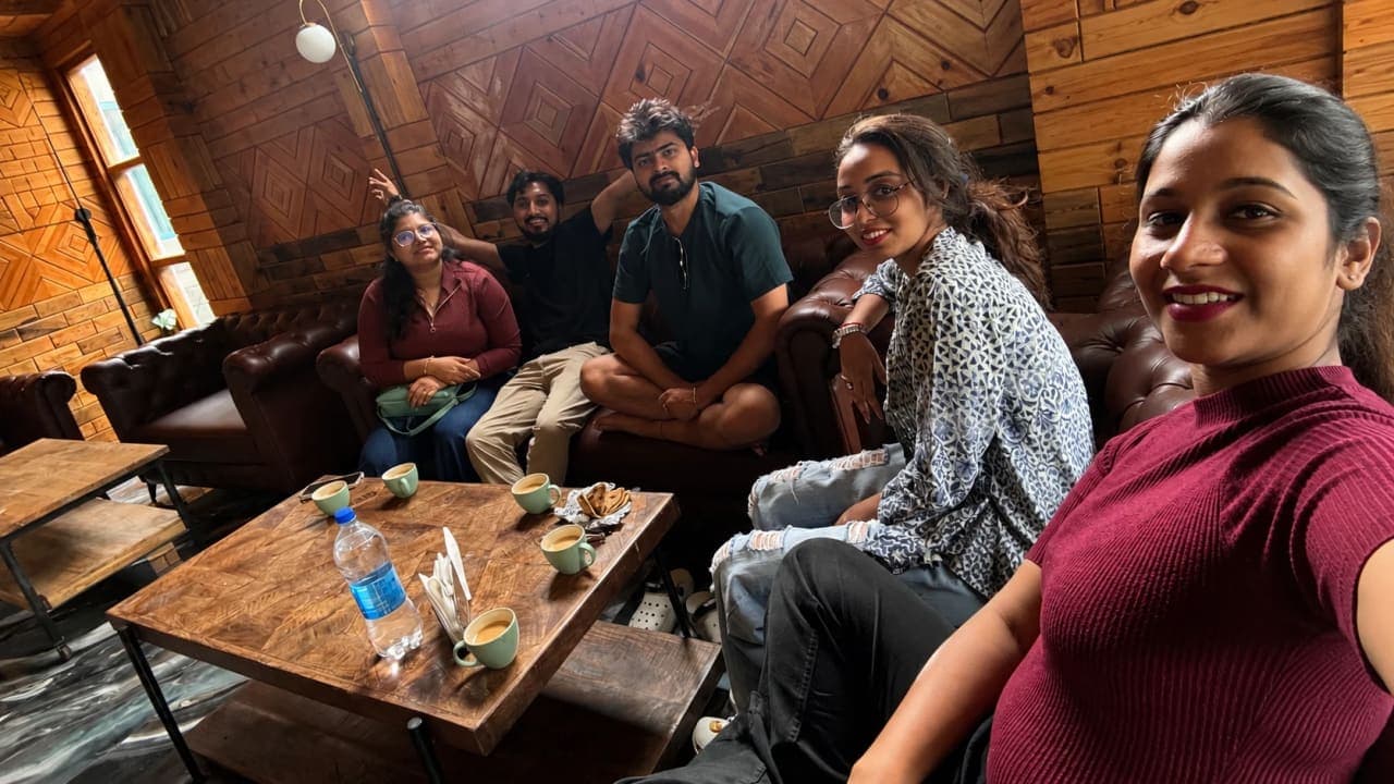 Travellers gathered in the hotel common hall in Jibhi, sharing tea, stories, and conversations that turned strangers into friends.