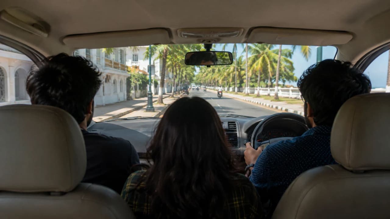 Cab ride through Pondicherry toward Paradise Beach on a sunny afternoon.