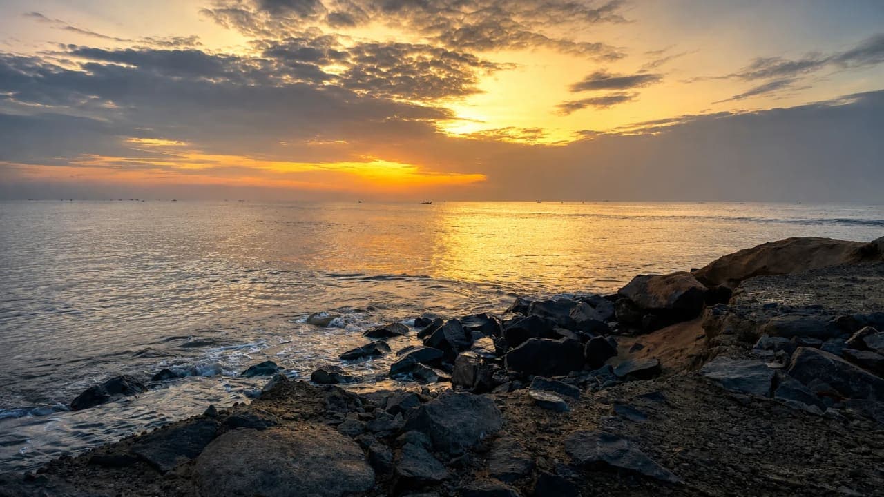 Friends watching sunset at Paradise Beach in Pondicherry.