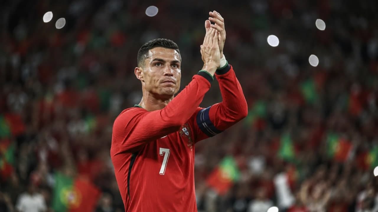 Cristiano Ronaldo applauds Portugal supporters after his final FIFA World Cup match.