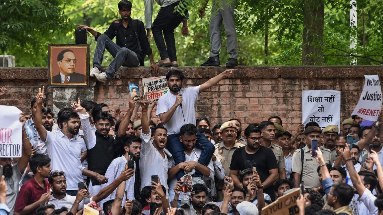 Thousands of students participating in a peaceful education reform protest near Parliament.