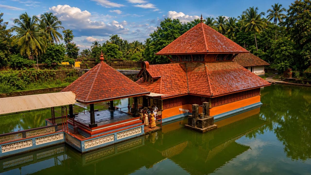 Ananthapura Lake Temple surrounded by a serene lake in Kasaragod, Kerala.