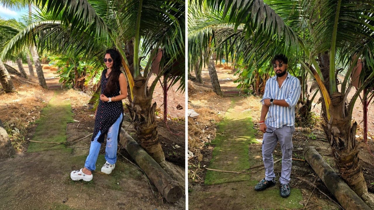 My husband and I posing near the local market during our houseboat stop in Alleppey, Kerala.