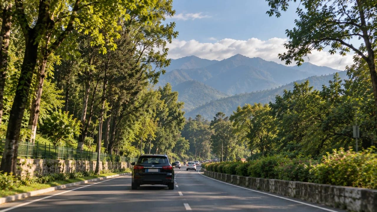 Car travelling through Dehradun towards Robber’s Cave after visiting FRI.